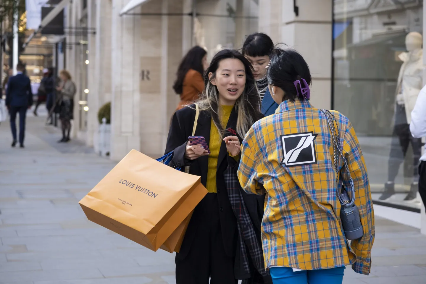 Shoppers with Louis Vuitton bags