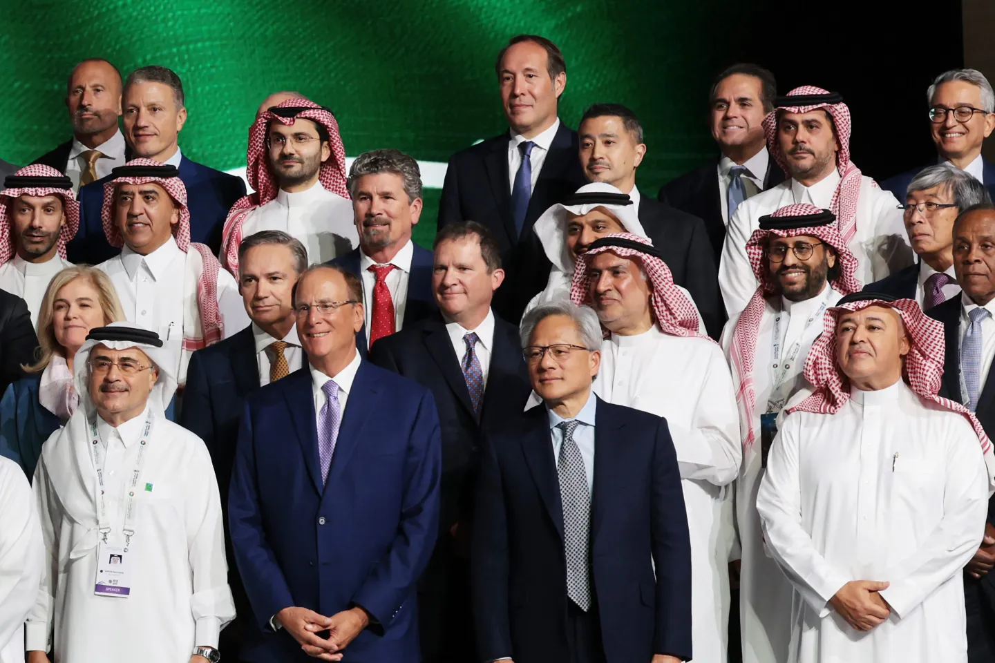 Jensen Huang poses for a photo with business leaders